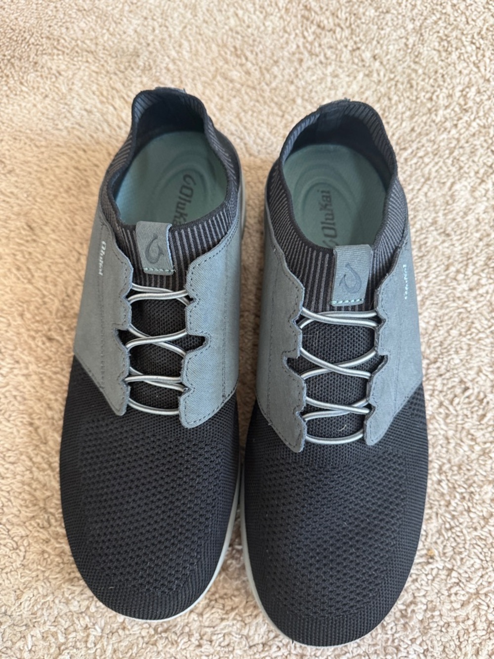 OluKai Men's Slip-On Knit Sneakers in Black and Gray